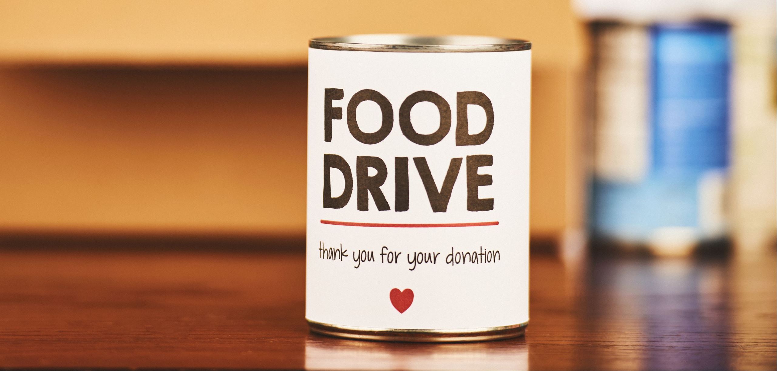 Aluminum can with a label that says Food Drive thank you for your donation