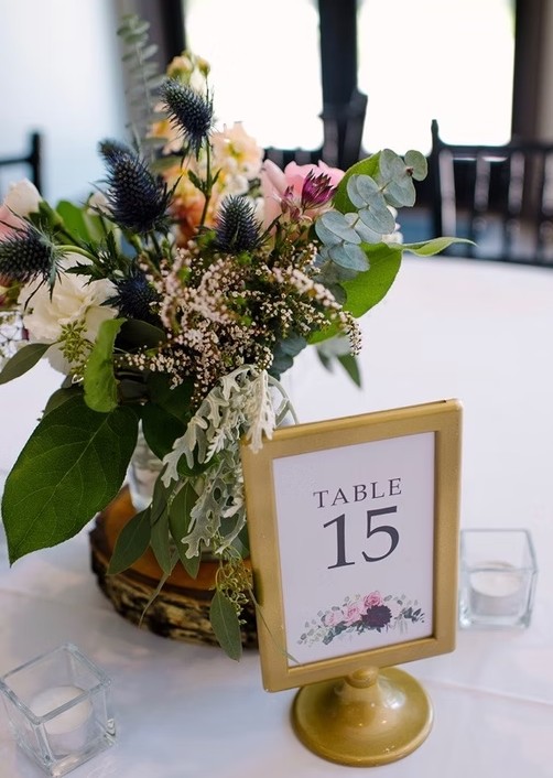 Table with vase of flowers